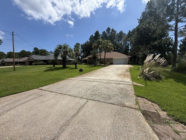 Property Photo: 6607 Leisure Street FL 32566