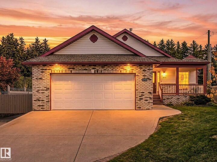 Property Photo:  10703 6 Avenue SW  AB T6W 1G3 