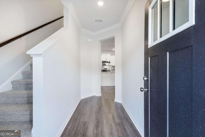 Property Photo: 401 Whitehorse Way 42 GA 30094