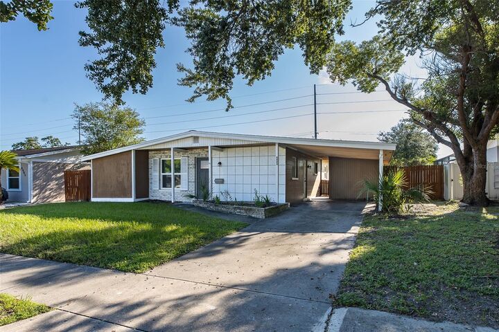 Property Photo:  4403 Gandy Circle  FL 33616 