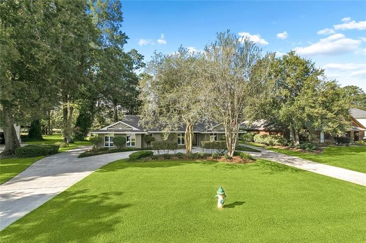 Property Photo:  689 N Beau Chene Drive  LA 70471 