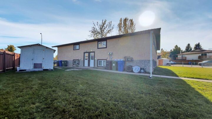 Property Photo:  5743 &Amp 5745 53 Street Close  AB T4T 1M6 
