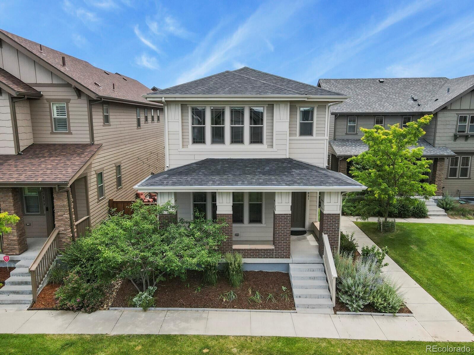 Property Photo:  5841 Alton Street  CO 80238 