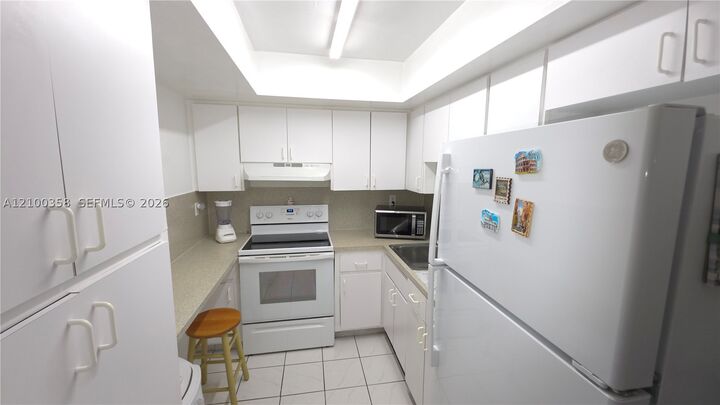 Property Photo:  11800 SW 18th St 205-4  FL 33175 