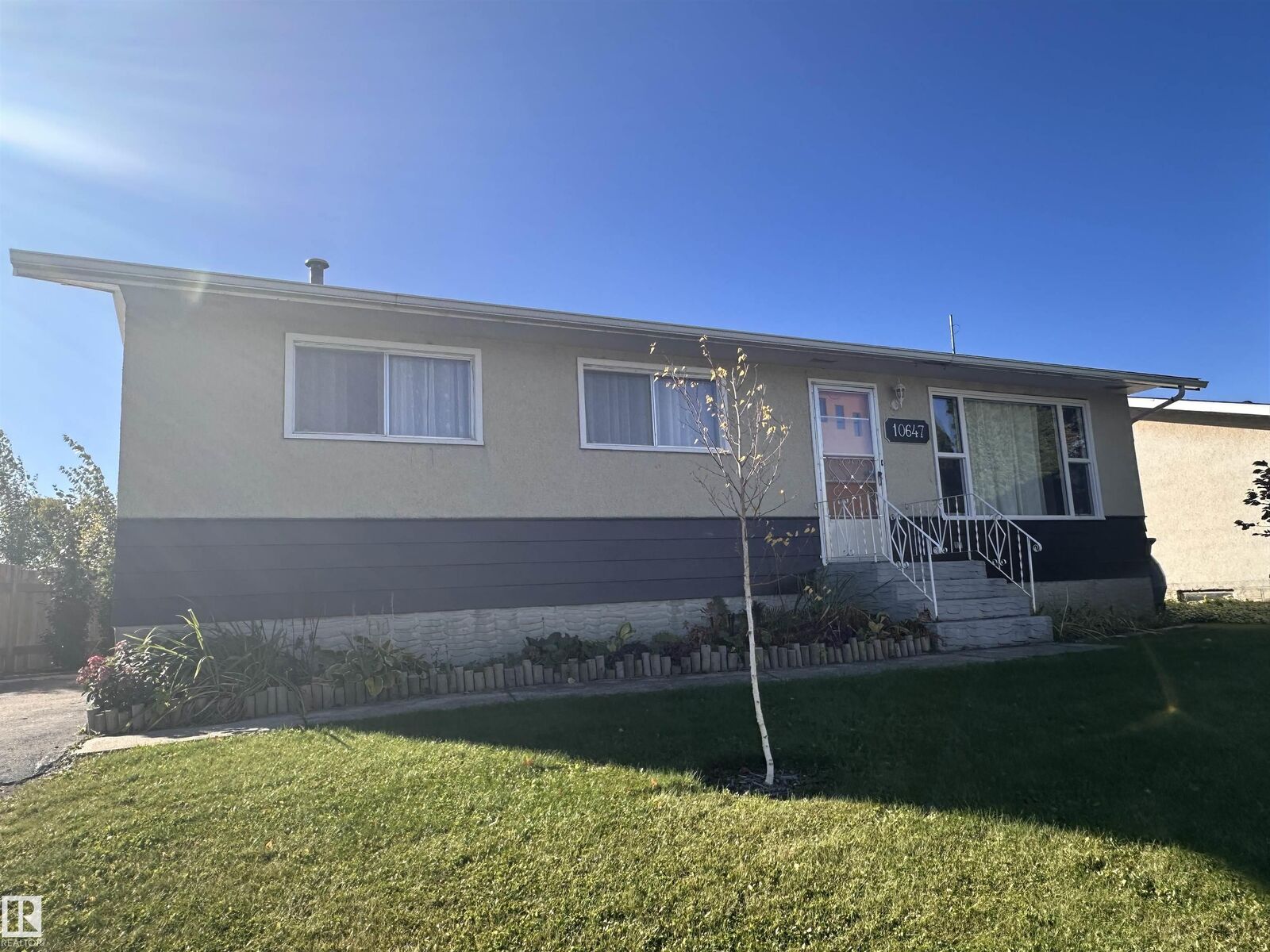Property Photo:  10647 106 Street  AB T7P 1J6 