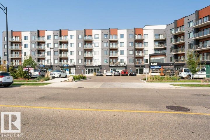 Property Photo:  1316 Windermere Way SW 306  AB T6W 2J3 