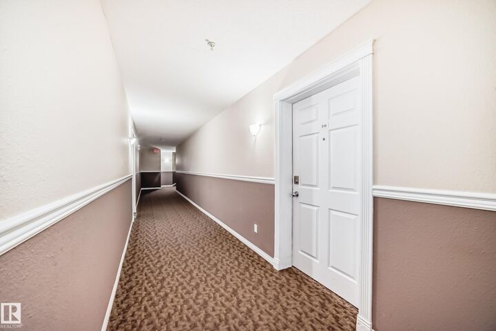 Property Photo:  4309 33 Street 302  AB T7Z 0C4 