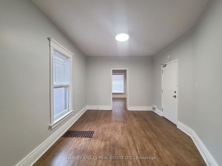 Property Photo:  1450 Dundas Street E Main  ON M4M 1S8 