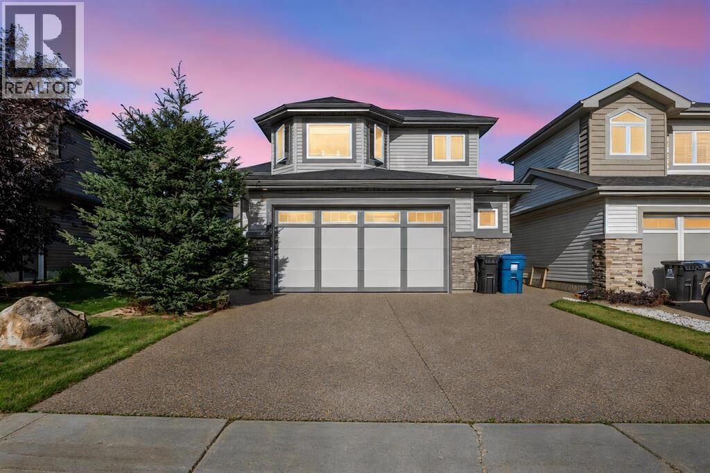 Property Photo: 616 Heritage Drive AB T9K 2X1