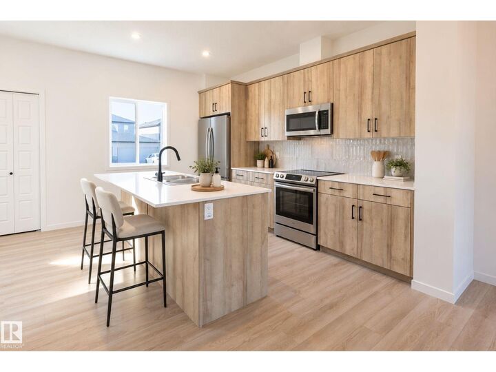 Property Photo: 213 Wattle Rd AB T9E 0V1