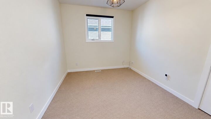 Property Photo:  3381 Chickadee Drive NW  AB T5S 0K9 
