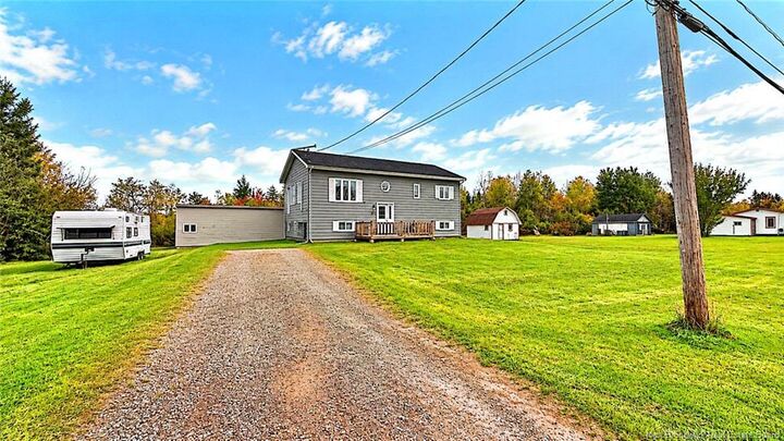 Property Photo:  394 Du Portage Avenue  NB E8N 1K6 