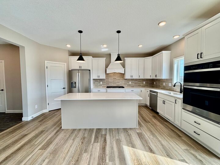 Property Photo:  941 Kepler Avenue NE  MN 55341 