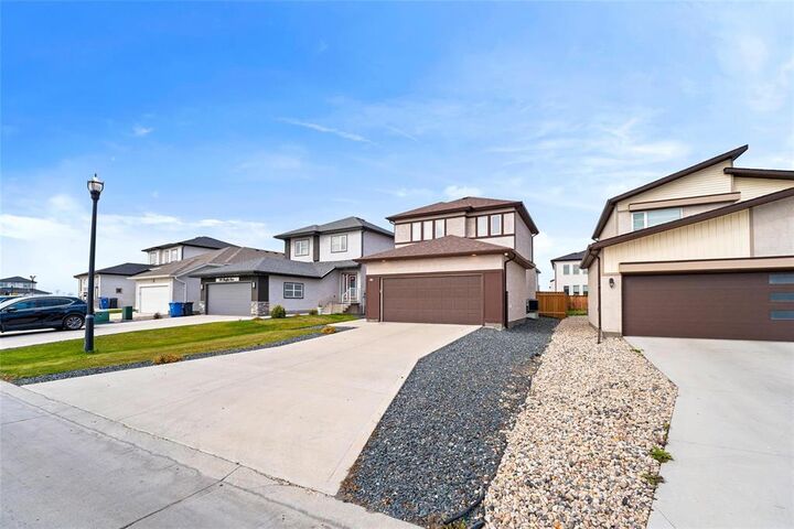 Property Photo: 114 Hughes Crescent MB R3Y 2B8
