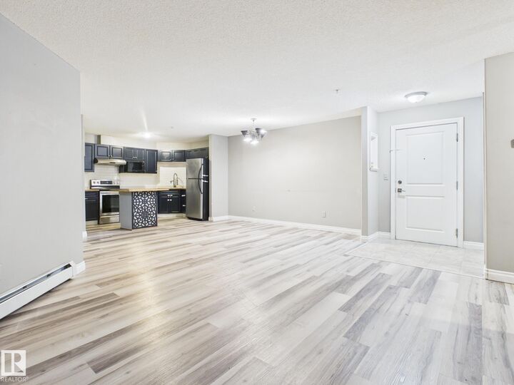 Property Photo:  16221 95 Street NW 102  AB T5Z 3V3 