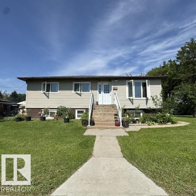Property Photo:  11404 127 Avenue NW  AB T5E 0C6 