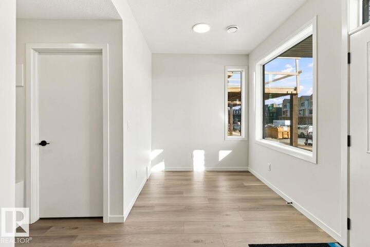 Property Photo: 2636 Alces Way SW AB T6X 3N9