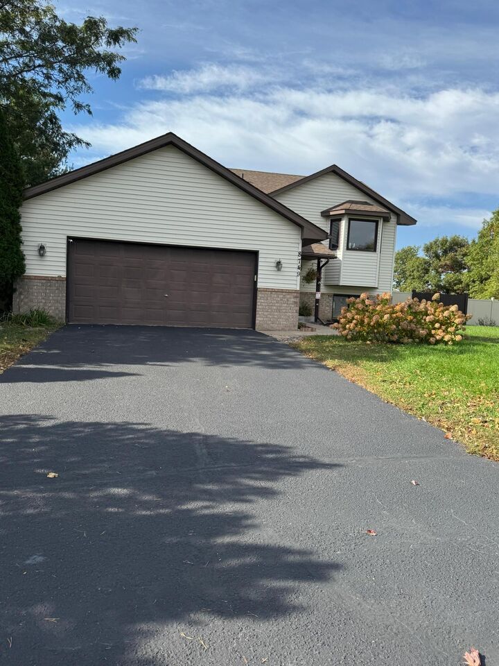 Property Photo:  8749 Queens Gardens  MN 55443 