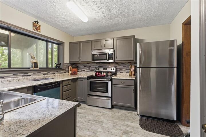 Property Photo:  624 Crippled Oak Trail  GA 30143 