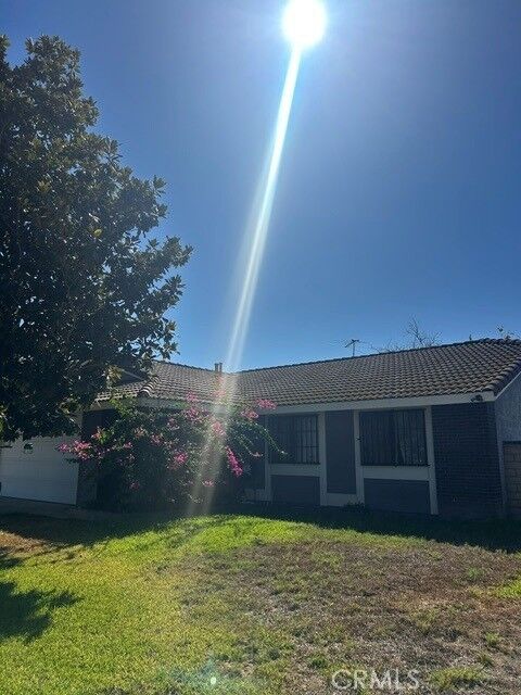 Property Photo:  9816 Bolton  CA 92503 