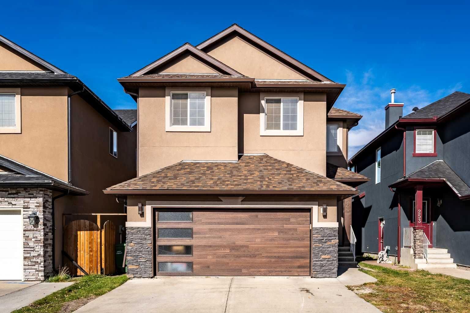 Property Photo: 249 Saddlecrest Way NE AB T3J 5N3