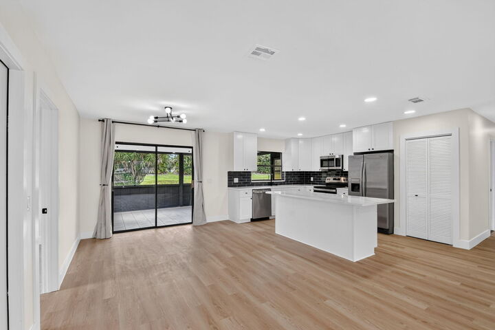 Property Photo: 8213 Rose Marie Avenue W FL 33472