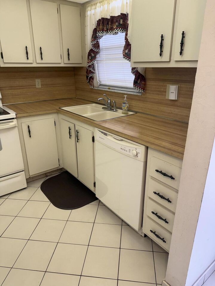 Property Photo:  6670 Royal Palm Boulevard 205K  FL 33063 