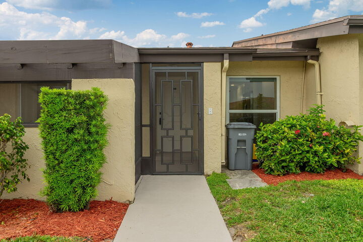 Property Photo:  13665 Via Aurora C  FL 33484 