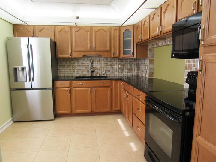Property Photo:  140 Lake Nancy Lane 216  FL 33411 