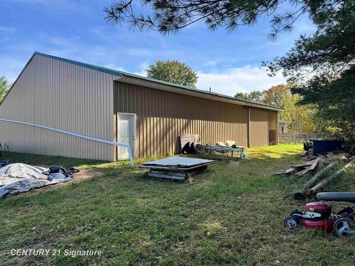 Property Photo:  1232 S Eight Mile Road  MI 48640 