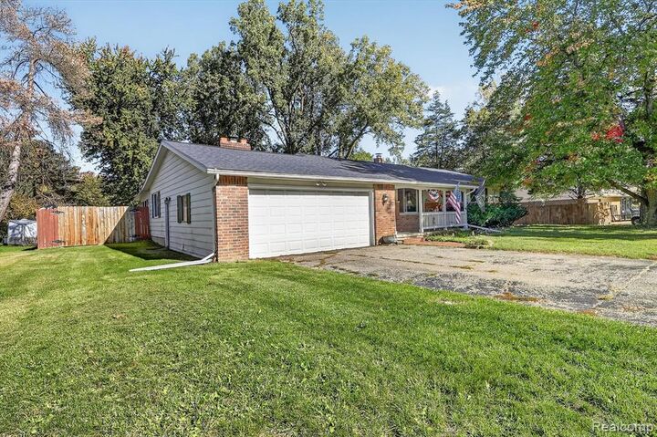 Property Photo:  9096 Carpenter Road  MI 48433 