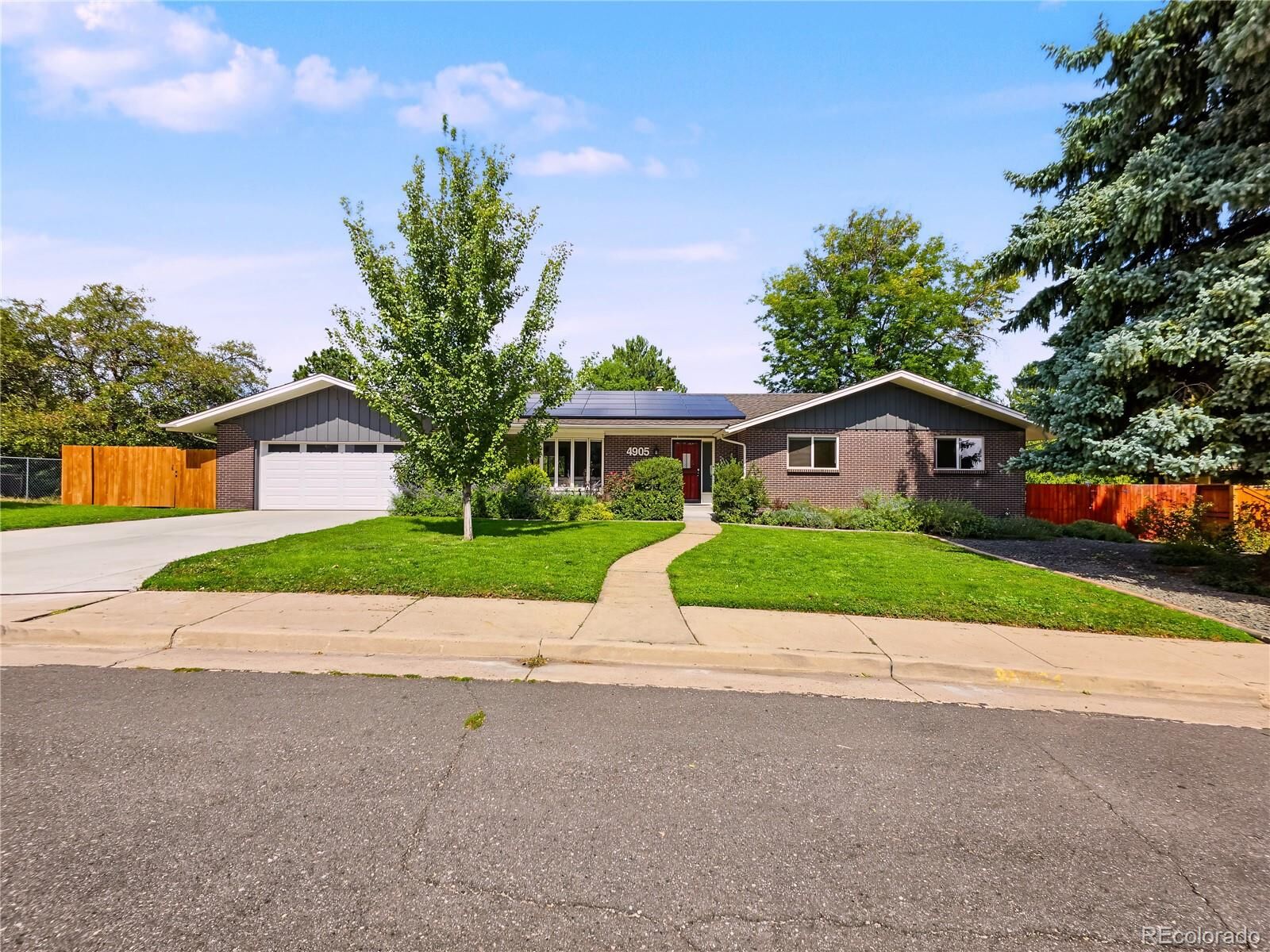 Property Photo:  4905 W Princeton Avenue  CO 80236 