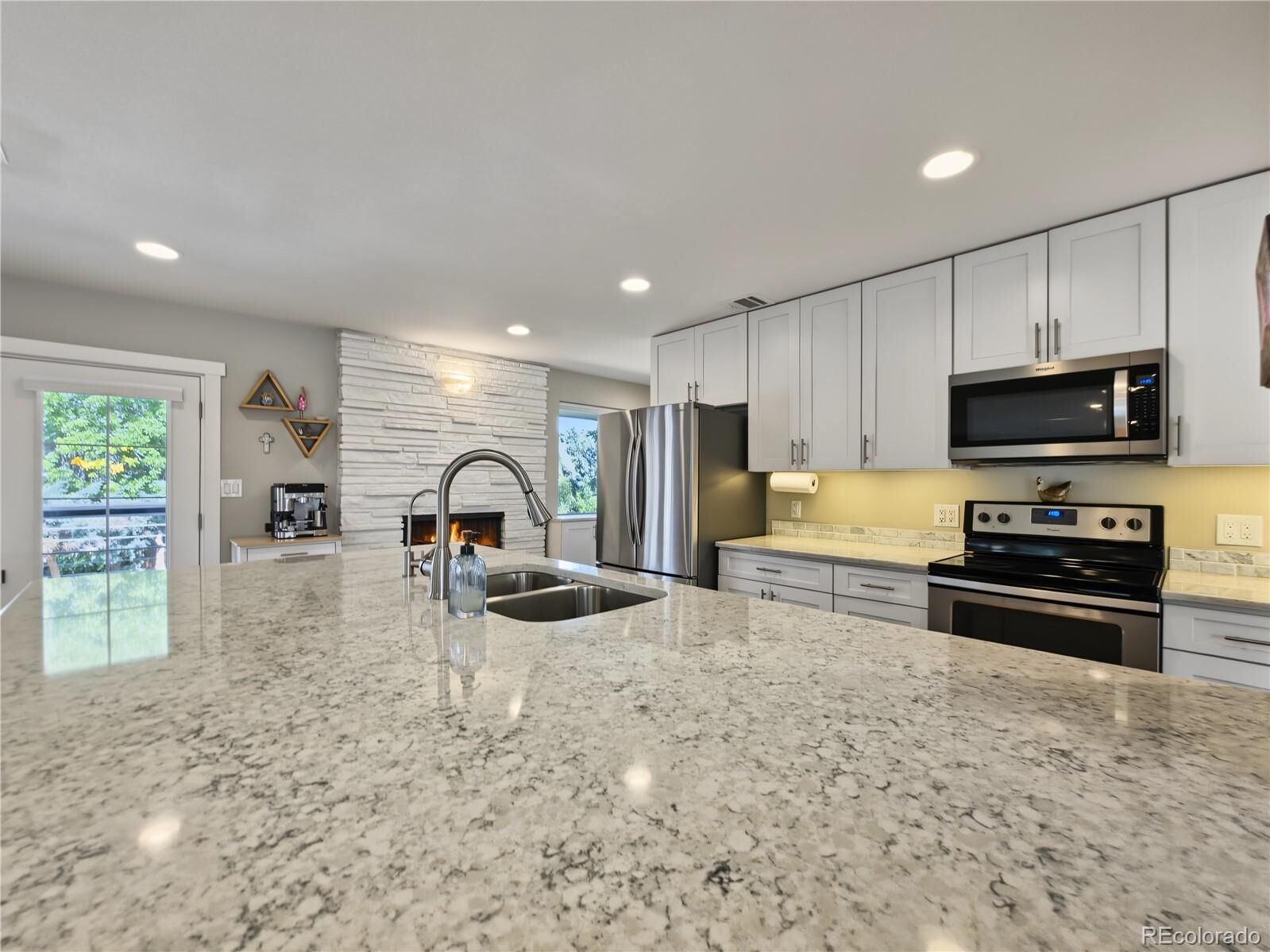 Property Photo:  4905 W Princeton Avenue  CO 80236 