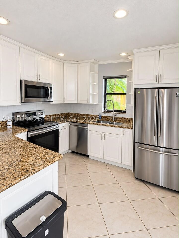 Property Photo:  7671 W Courtyard Run W  FL 33433 