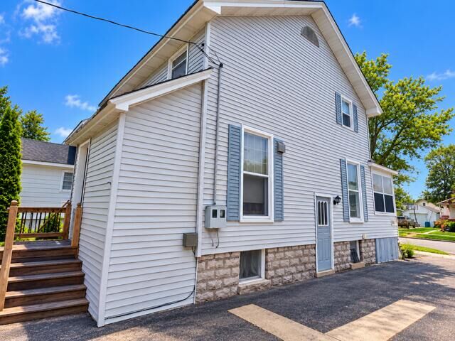 Property Photo:  115 E Lewis Street  MI 49707 