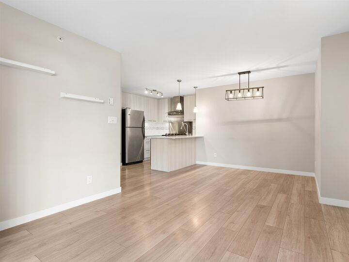 Property Photo:  8480 Granville Avenue 219  BC V6Y 4E8 