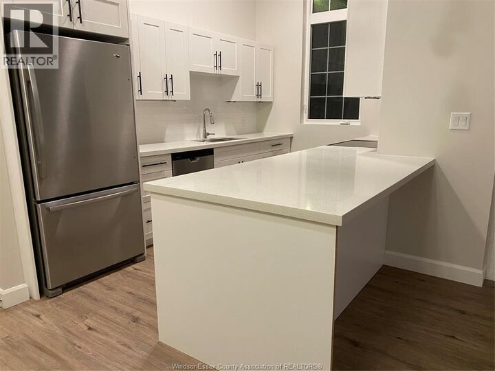Property Photo:  11941 Tecumseh Road East 305  ON N8N 1L8 