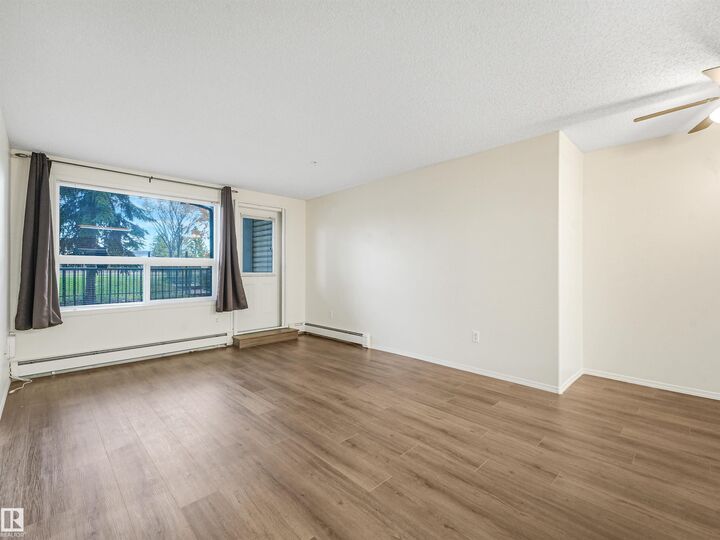 Property Photo:  13635 34 Street NW 112  AB T5A 0C4 