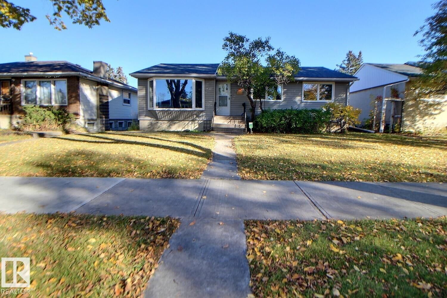 Property Photo:  11511 135 Street NW  AB T5M 1K9 