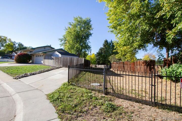 Property Photo:  6459 Iris Street  CO 80004 