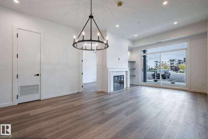 Property Photo:  7459 May Common NW 102  AB T6R 0X6 