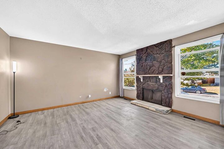 Property Photo:  143 Rundleson Way NE  AB T1Y 3H8 