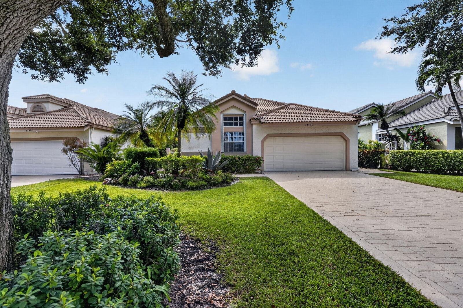 Property Photo:  12850 Oak Knoll Drive  FL 33418 