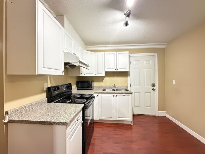 Property Photo:  7730 Nelson Avenue 1bd  BC V5J 4C9 