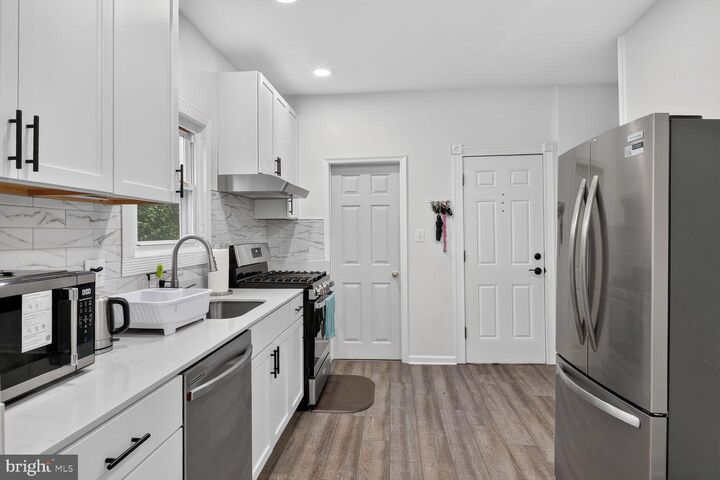 Property Photo:  5516 Windsor Mill Road  MD 21207 