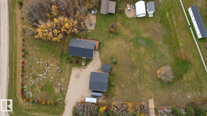 Property Photo:  225 & 227 57201 Range Road 102  AB T0A 3A0 