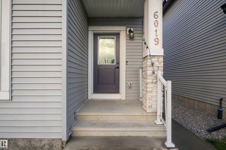 Property Photo:  6019 180 Avenue NW  AB T5Y 3W9 