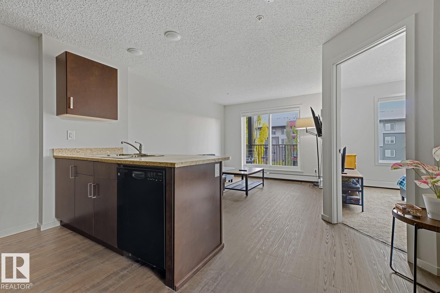 Property Photo:  5521 7 Avenue SW 303  AB T6X 2A8 