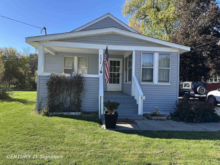 Property Photo:  5058 Morrish Road  MI 48473 