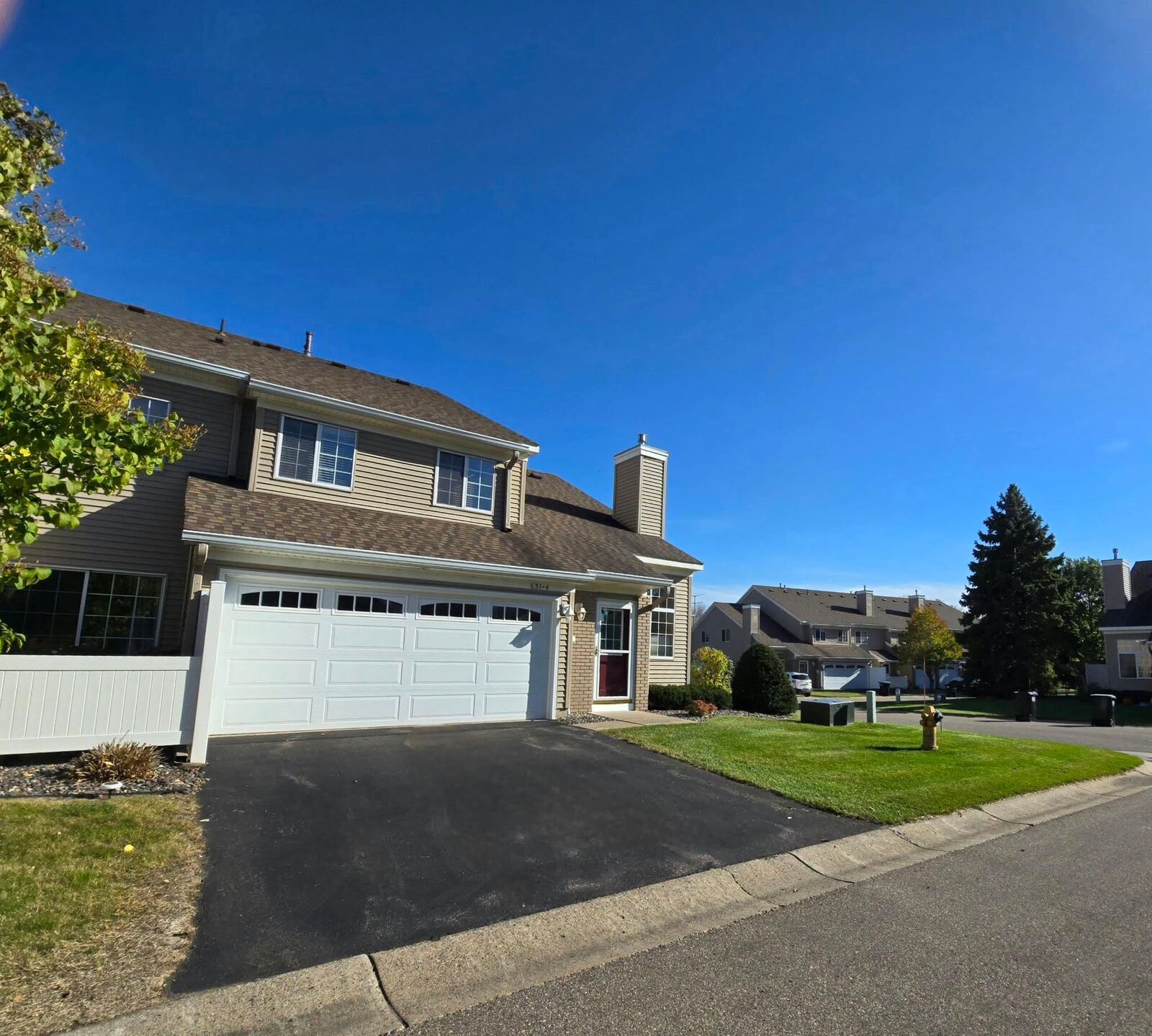 Property Photo:  631 85th Lane NW 4  MN 55433 